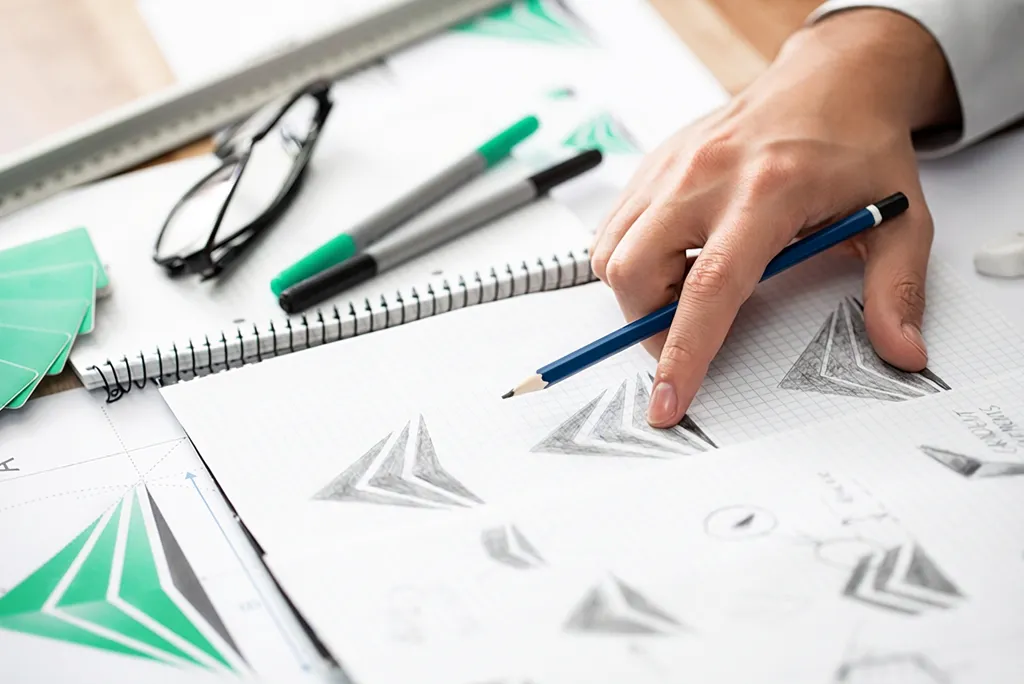 esquisse d'un logo fait par un graphiste peut déterminer Combien coûte un logo par le temps et nombre d'esquisse